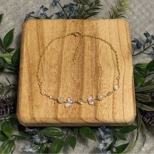 Iridescent butterfly choker